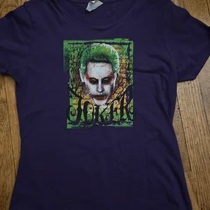 Joker shirt, that is purple. Only worn twice women’s small.